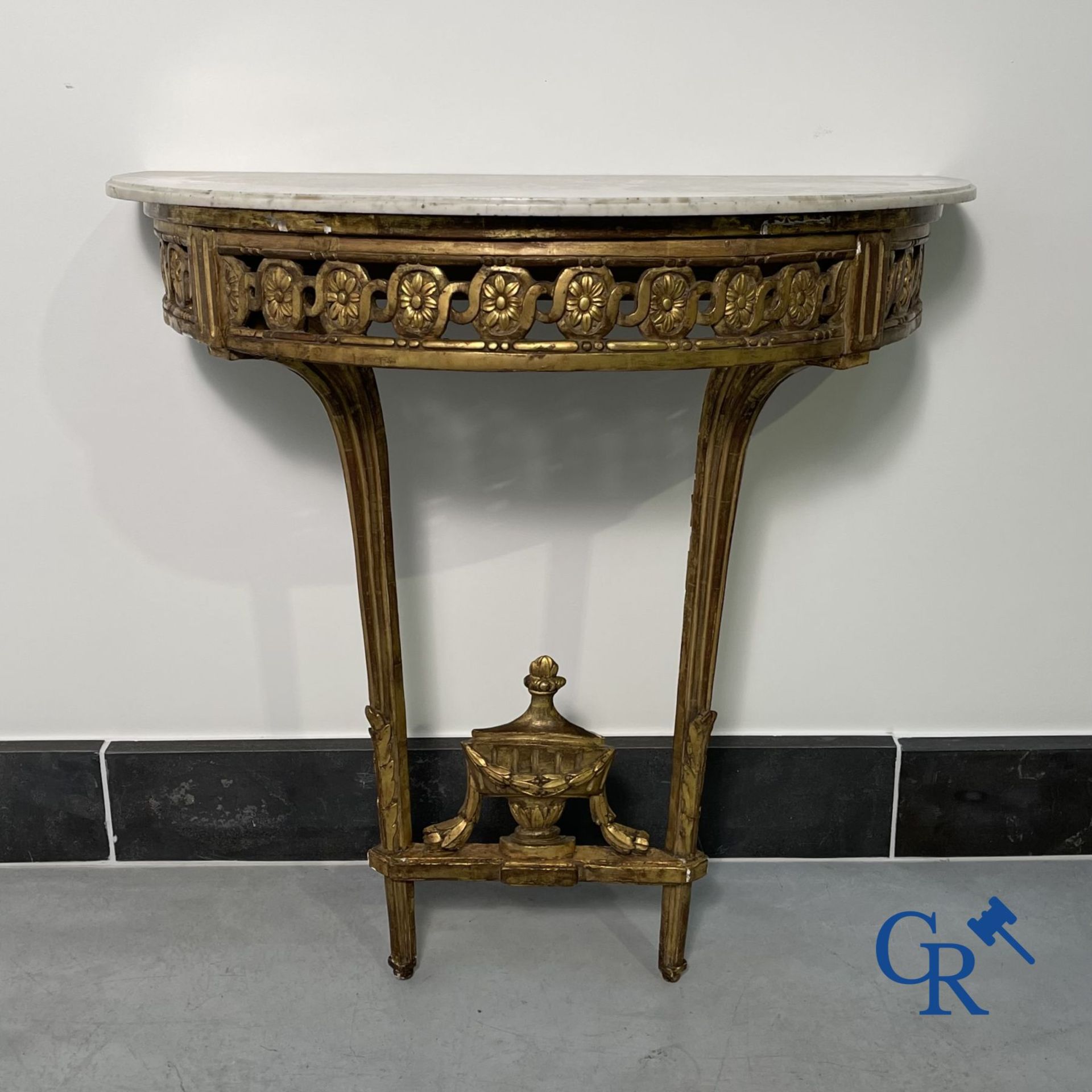 Furniture: Wood sculpted and gilded crescent shaped console. LXVI-period.