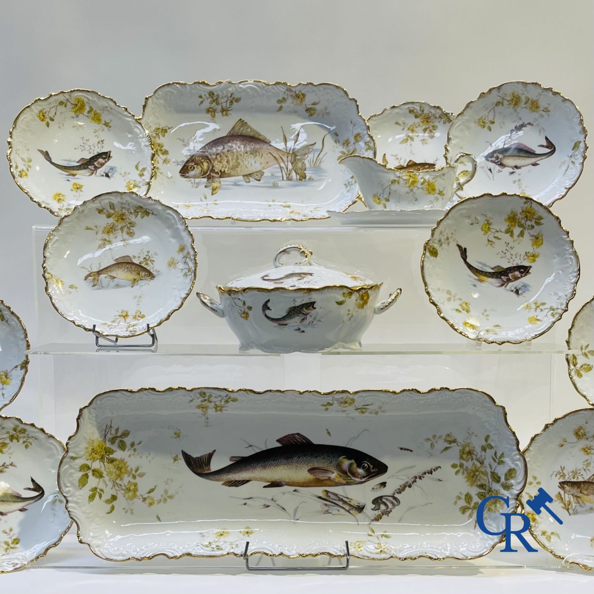Extraordinary tableware in Brussels porcelain with a theme of freshwater fish.