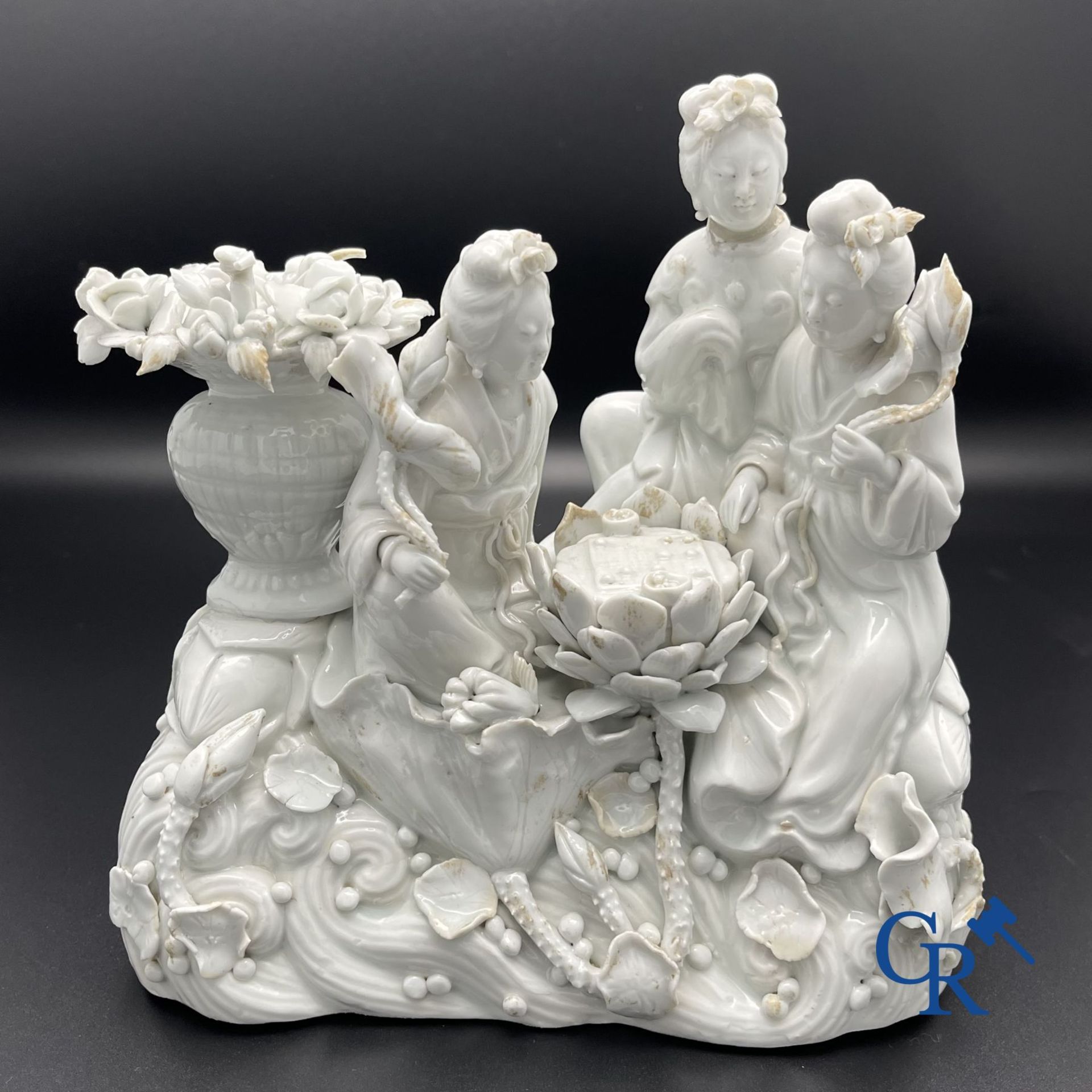 Chinese porcelain: A Buddhist lion and a group in blanc de Chine. - Image 4 of 28