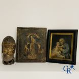 2 religious paintings and a wooden sculpted head of a saint.
19th century.