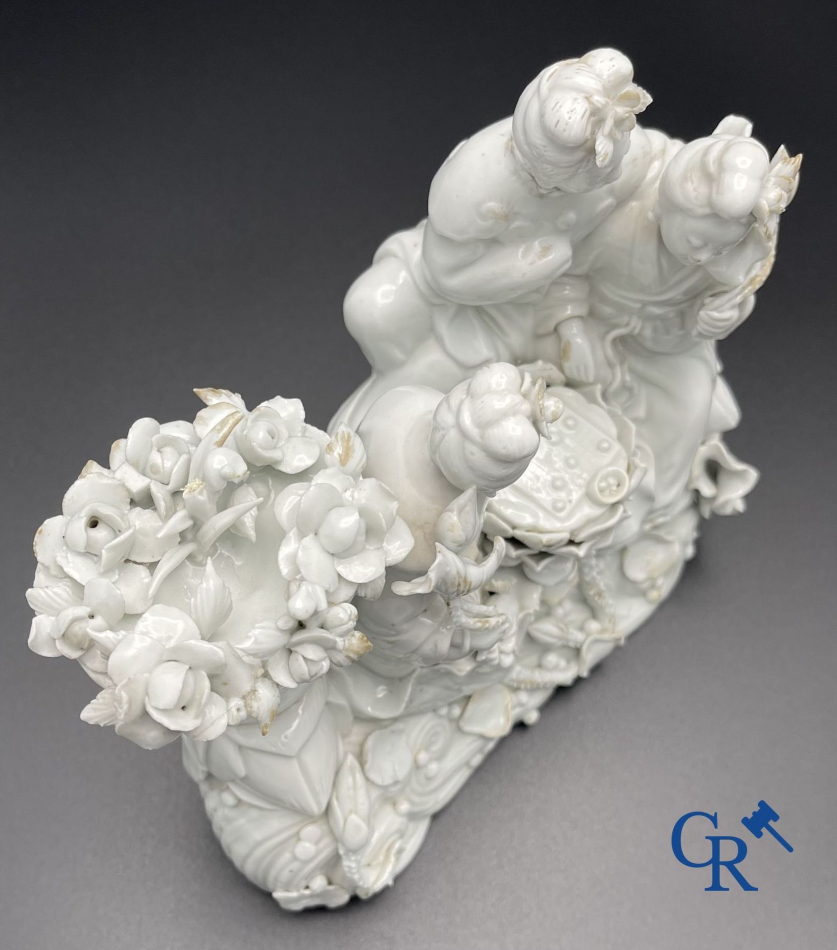 Chinese porcelain: A Buddhist lion and a group in blanc de Chine. - Image 11 of 28