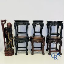 Asian Art: A lot of 6 Chinese wooden pedestals and a large wood-carved Chinese sage.