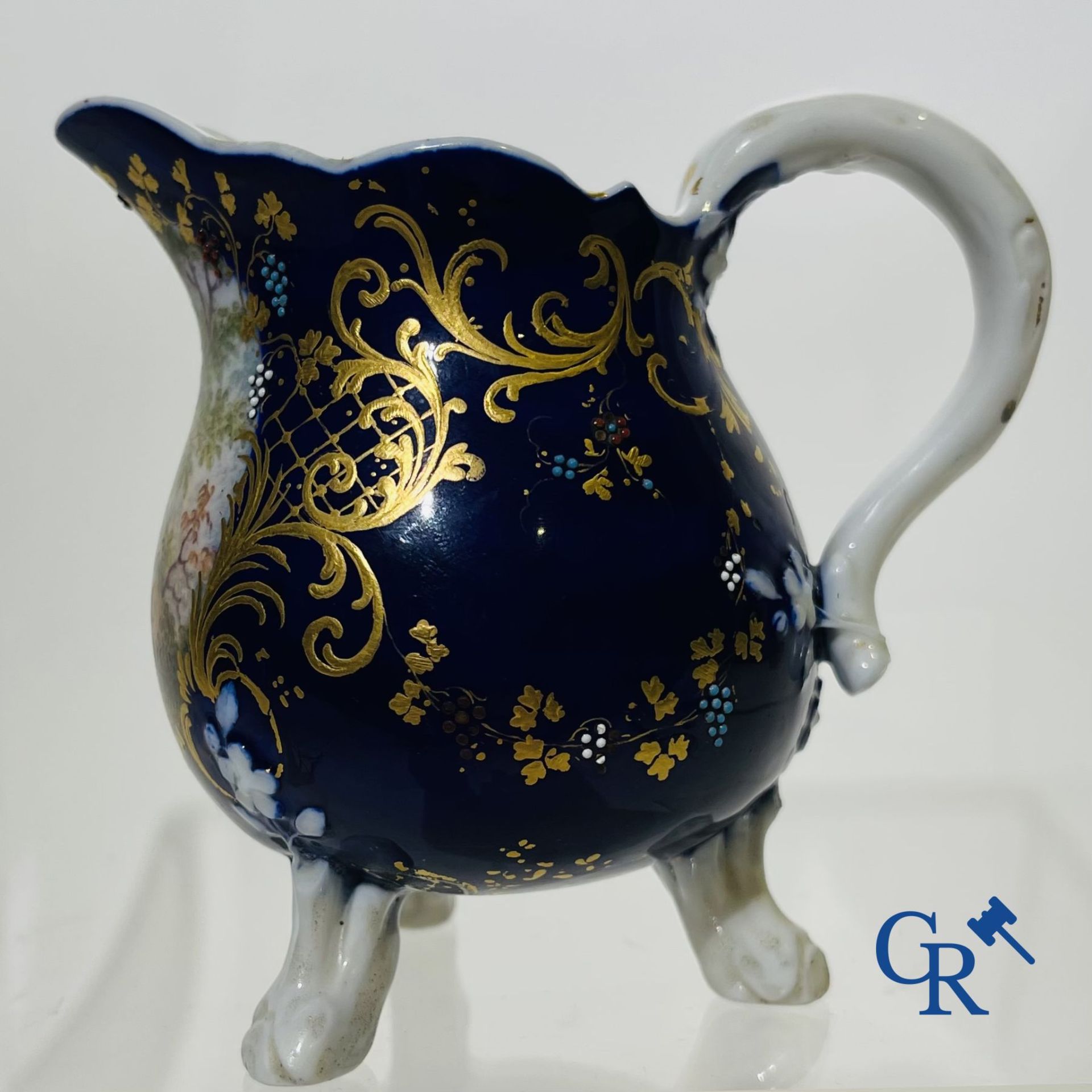 Vincennes 18th century. A three-legged milk jug in soft porcelain with lapis blue background. - Image 3 of 15