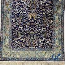 Oriental carpets: Iran. Isfahan, Persian hand-knotted carpet with a decor of animals, birds, plants 