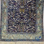 Oriental carpets: Iran. Isfahan, Persian hand-knotted carpet with a decor of animals, birds, plants 