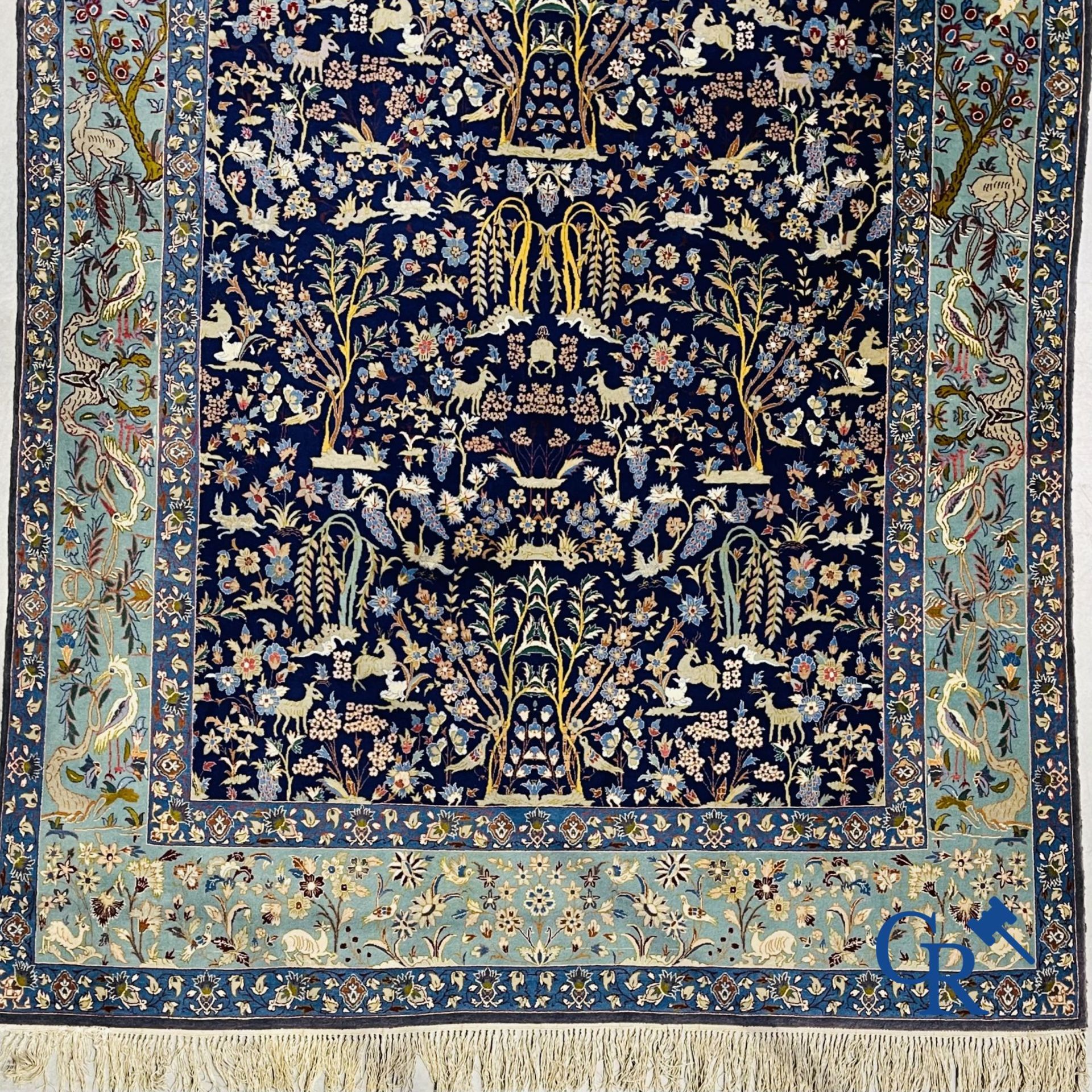 Oriental carpets: Iran. Isfahan, Persian hand-knotted carpet with a decor of animals, birds, plants 