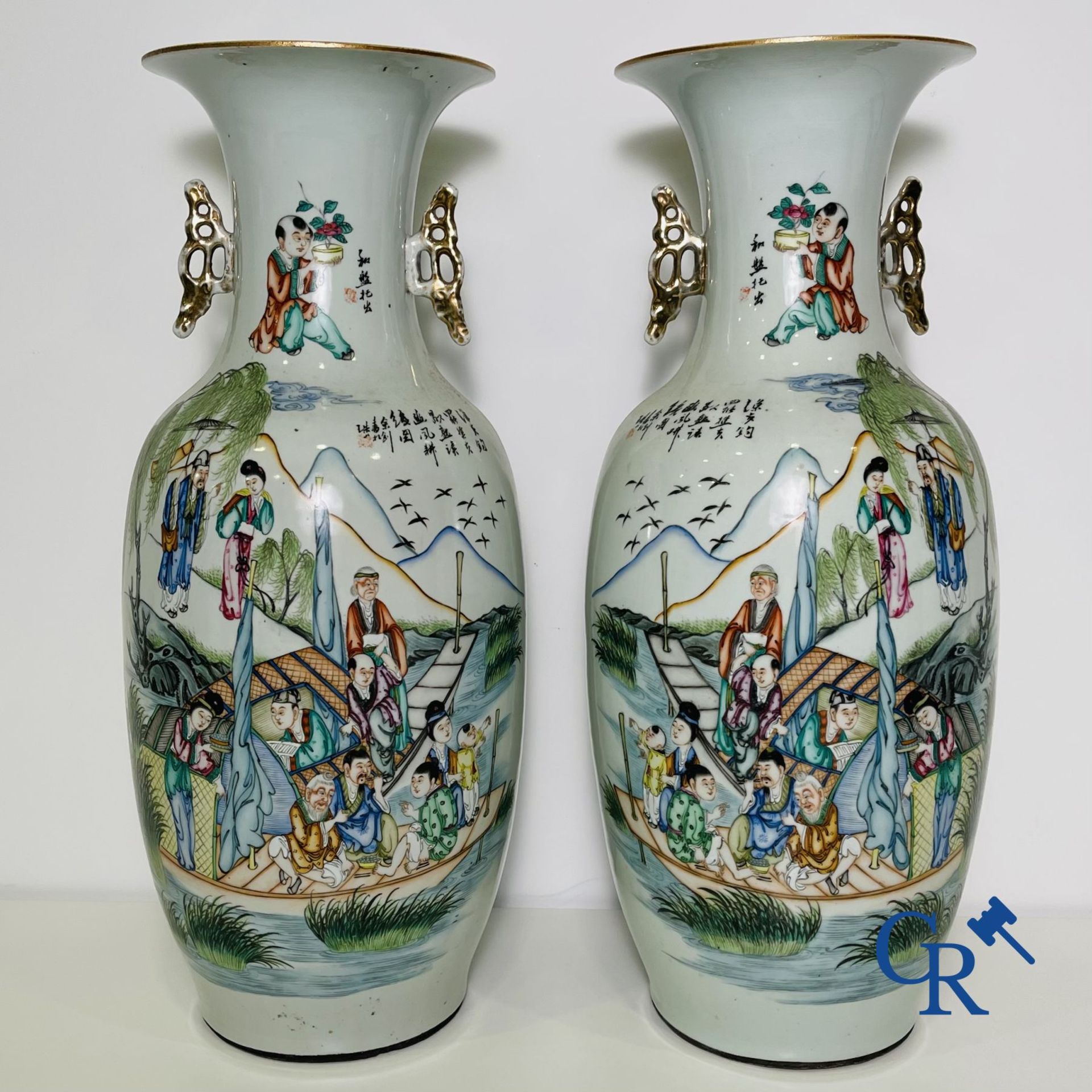 Chinese porcelain: A pair of Chinese vases with a double decor.