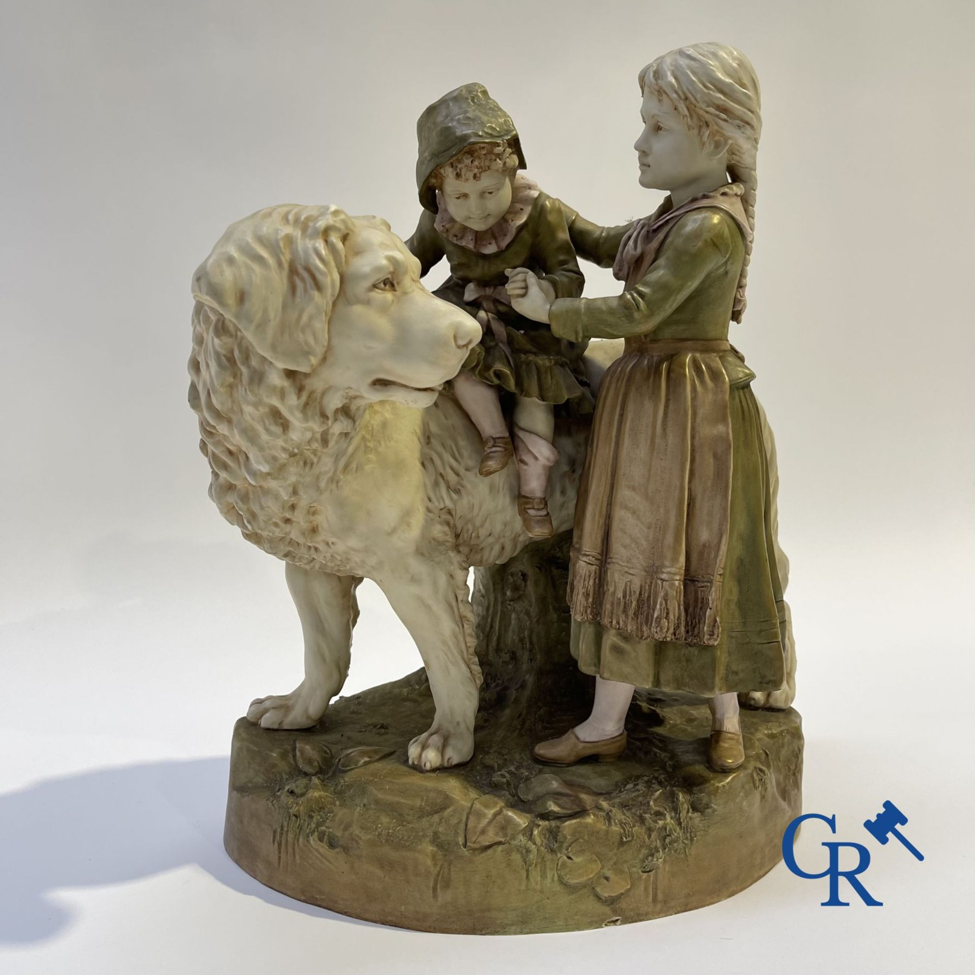 Porcelain: Royal Dux. A polychrome representation of a Saint Bernard dog with children. - Bild 2 aus 10