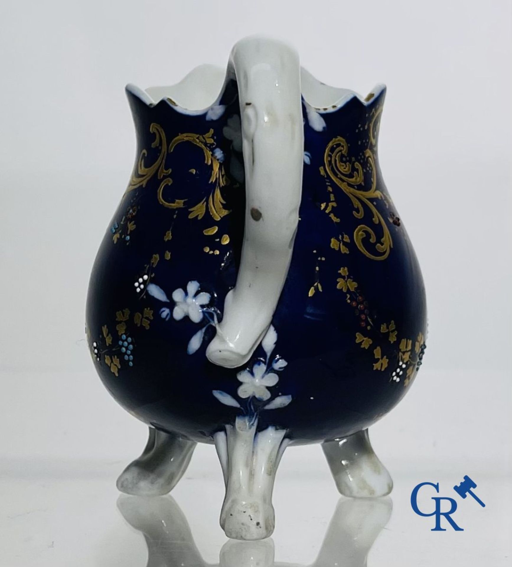 Vincennes 18th century. A three-legged milk jug in soft porcelain with lapis blue background. - Image 9 of 15