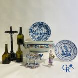 A part of a North French fountain and various pieces in faience and various antiques.