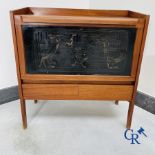 Design: 1950s - 60 bar furniture in exotic wood with paintwork.