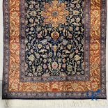 Oriental carpets: Persian carpet in wool. Floral decor.