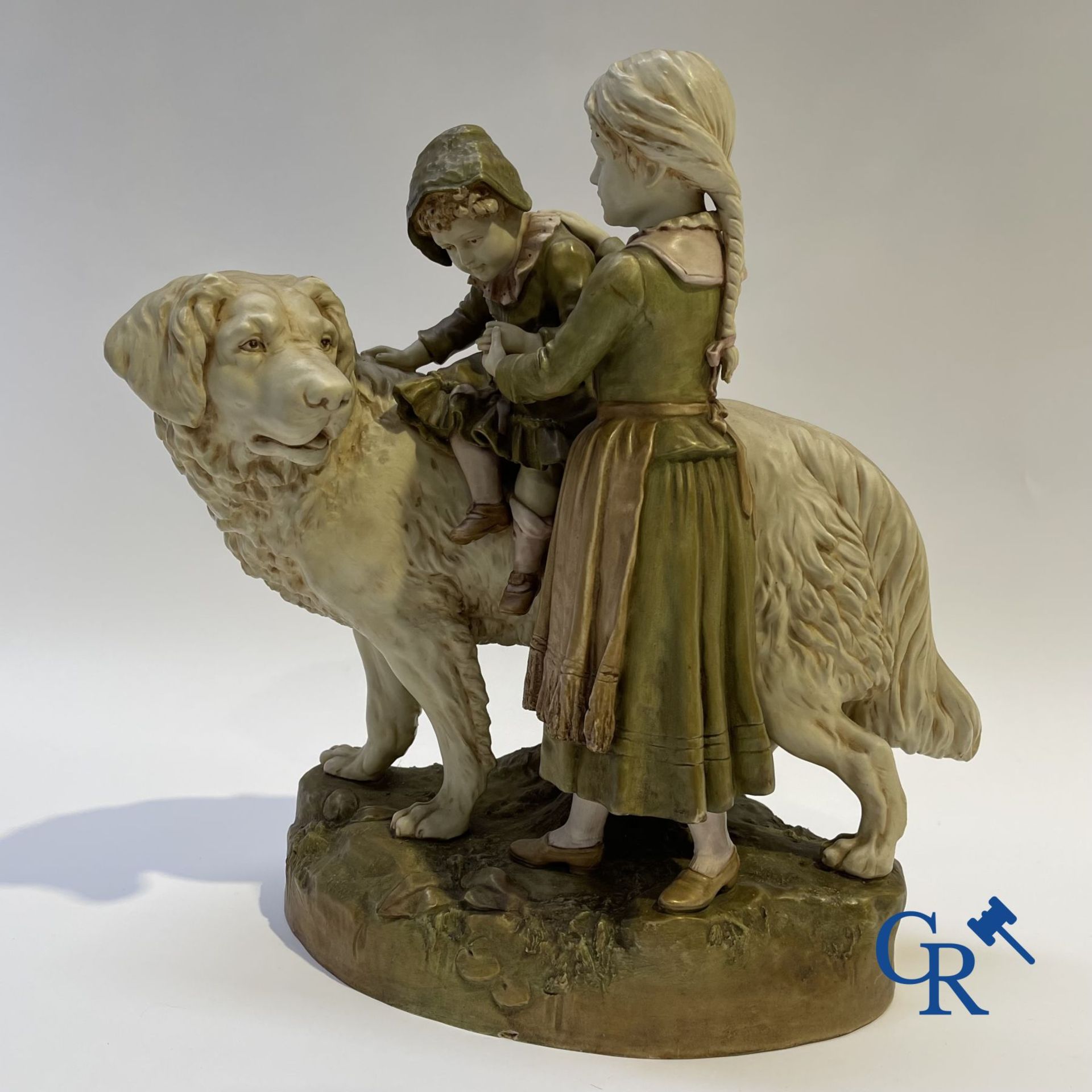 Porcelain: Royal Dux. A polychrome representation of a Saint Bernard dog with children. - Bild 3 aus 10