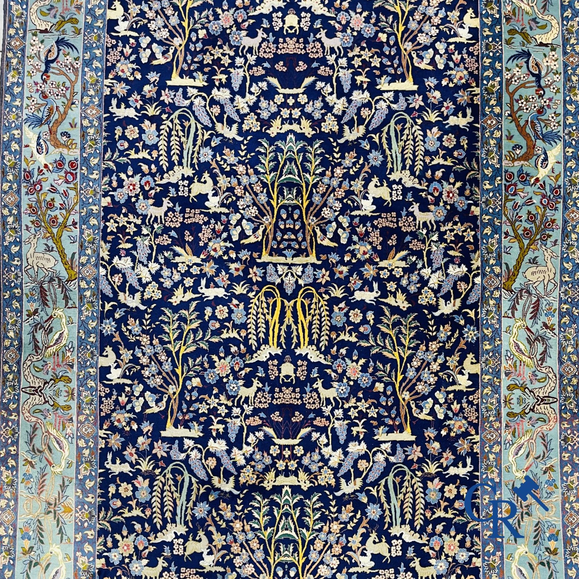 Oriental carpets: Iran. Isfahan, Persian hand-knotted carpet with a decor of animals, birds, plants  - Image 3 of 11