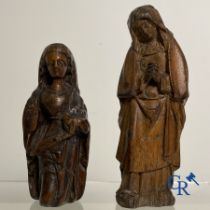 2 religious fragments in palm wood and lime wood. 16th-17th century.