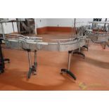 SS bottling conveyor, ~25' of belt, 4.5" W, 36" H, 2) 90dg turns, SS frame, adj. (missing belt)