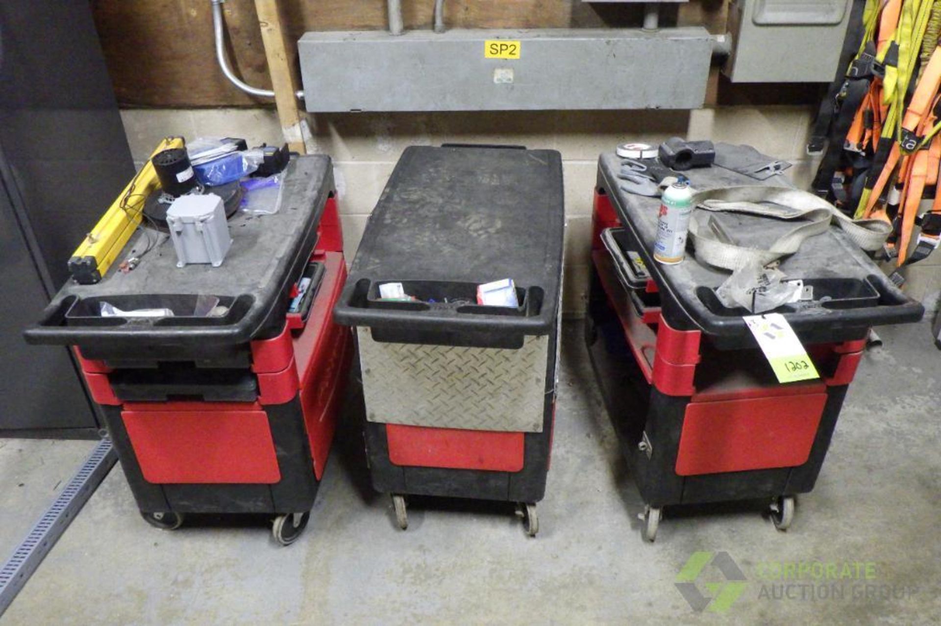 (3) Rubbermaid rolling carts with contents