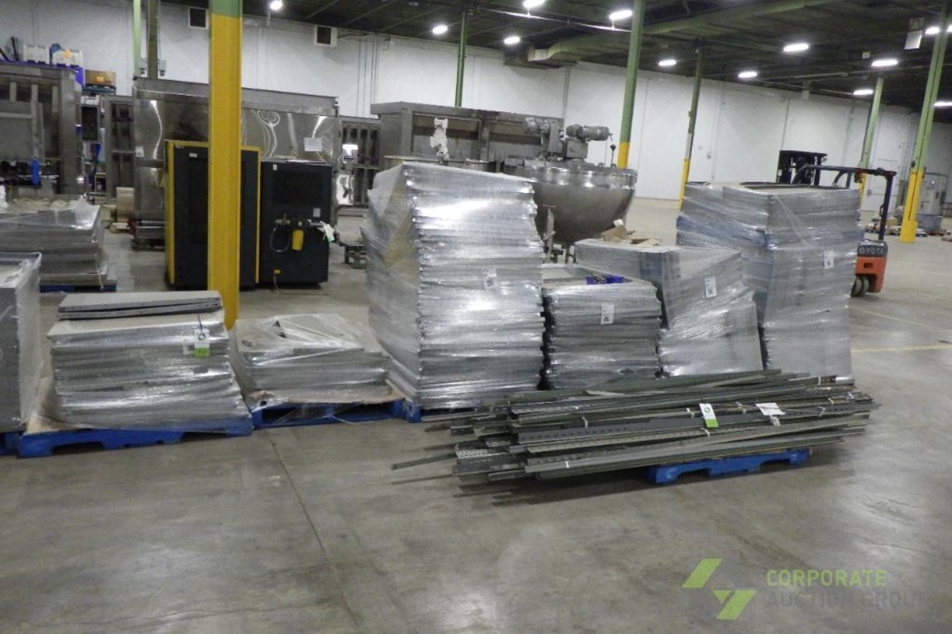 (7) pallets of steel shelving