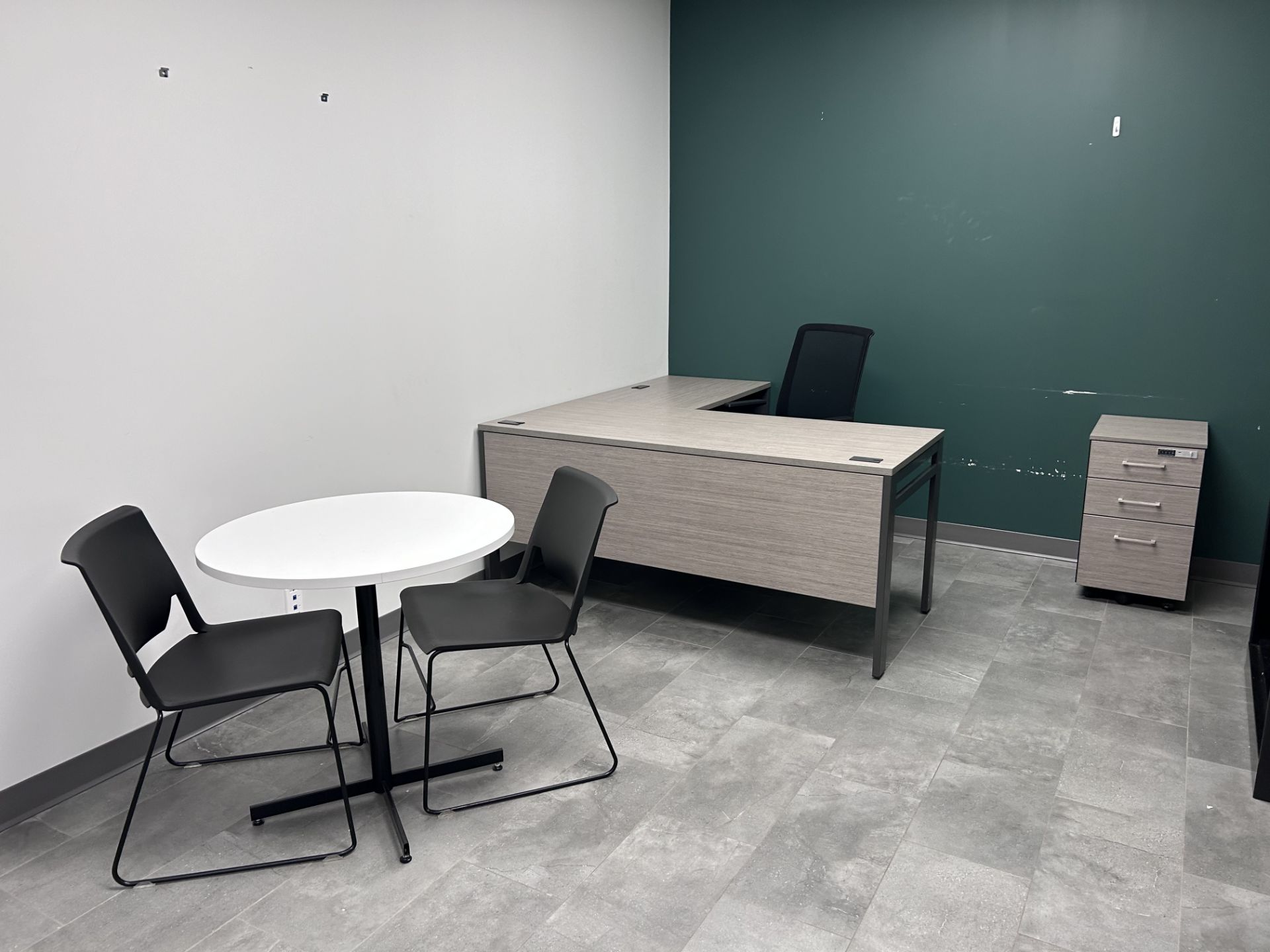 Contents of office incl: (1)"L" Shape desk, (1)executive chair, (2) conference chairs (1) round