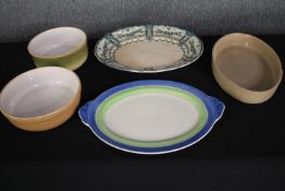 A collection of bowls and serving plates made by Pearson of Chester, Gray's Pottery and others. L.39