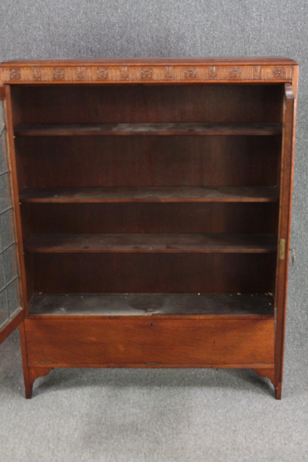 Bookcase, mid century oak with leaded and coloured glass doors. H.137 W.107 D.24cm. - Image 7 of 8