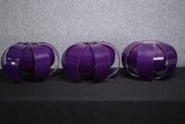 A collection of three Lucite Lotus flower pendants lights. Purple Perspex. Probably 1960s. H.22 Dia.