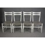 Dining chairs, a set of four mid century Danish style, white lacquered.