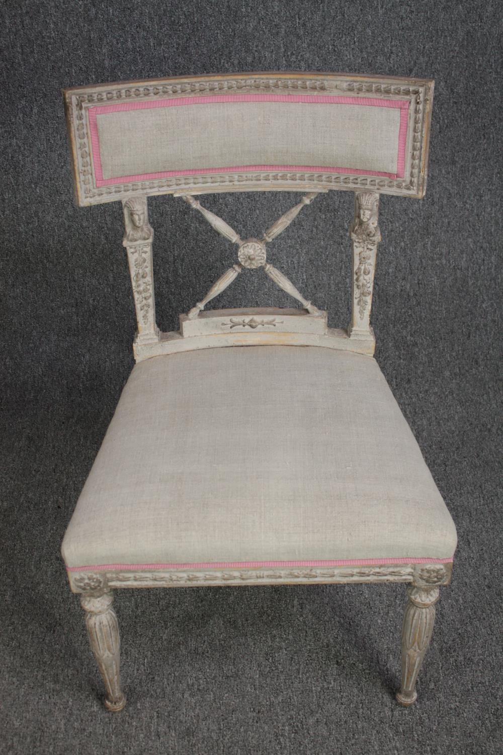 A pair of 19th century painted dining chairs in the Gustavian style. - Image 2 of 4