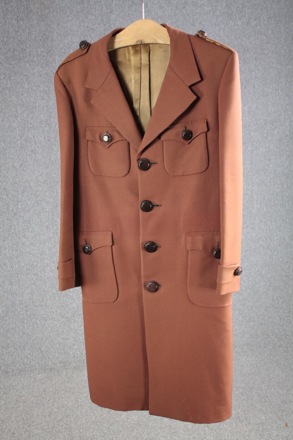 A vintage tailor made silk mix overcoat with maker's label.