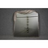 Wall mirror, contemporary with moulded drape decoration. H.120 W.102cm.