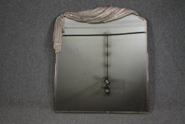 Wall mirror, contemporary with moulded drape decoration. H.120 W.102cm.