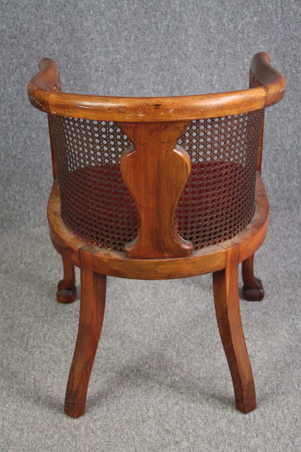 A mid century walnut George I style tub chair with bergere caned back and sides. H.88 W.56cm. - Image 4 of 5