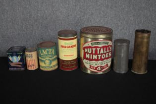 A collection of vintage tinned foods including an unopened can of 'Lacta (Full Cream) Next Best to
