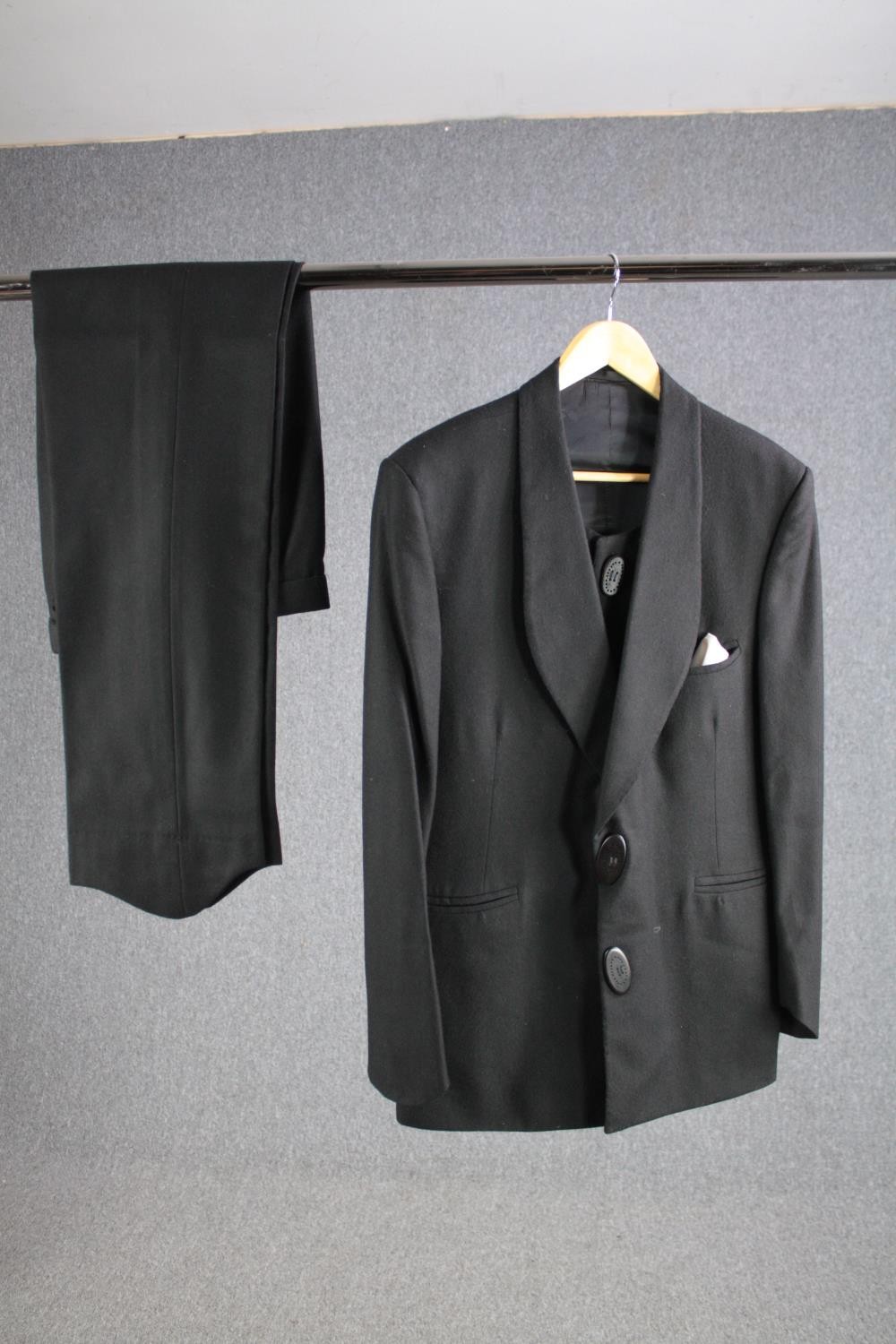 A vintage bespoke made black woollen three piece suit.