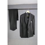 A vintage bespoke made black woollen three piece suit.