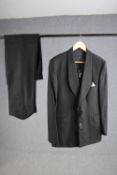 A vintage bespoke made black woollen three piece suit.