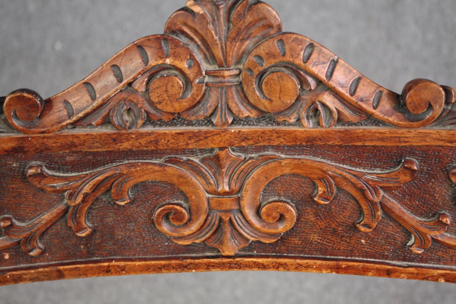 A 19th century carved walnut Savonarola chair. H.85 W.62cm. - Image 6 of 6