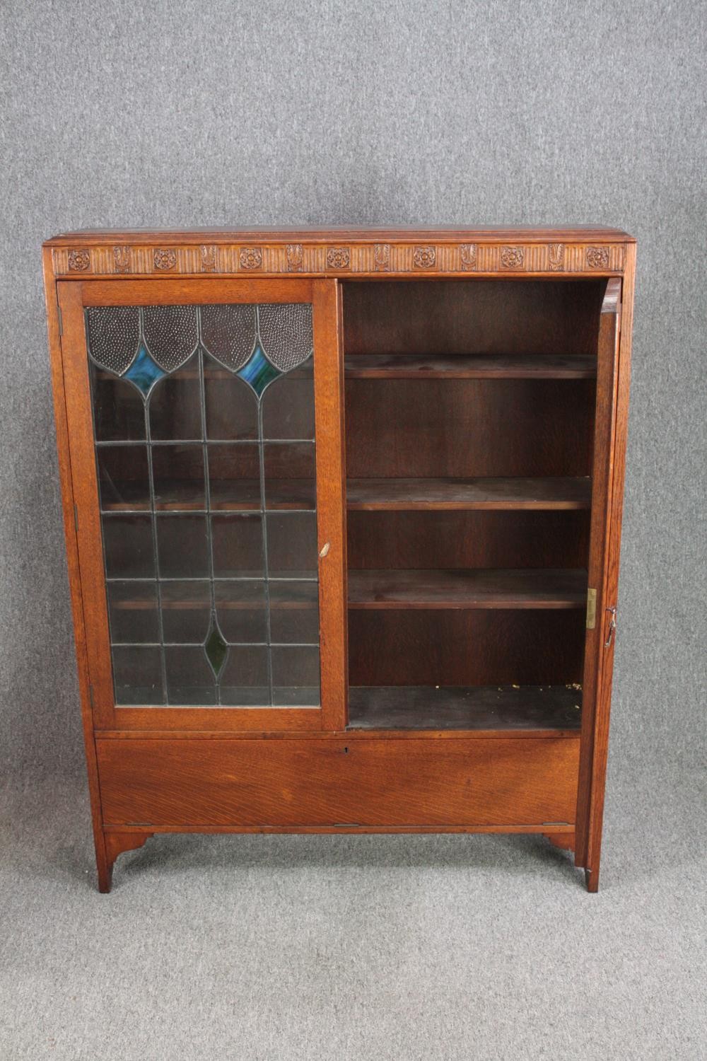 Bookcase, mid century oak with leaded and coloured glass doors. H.137 W.107 D.24cm. - Image 5 of 8