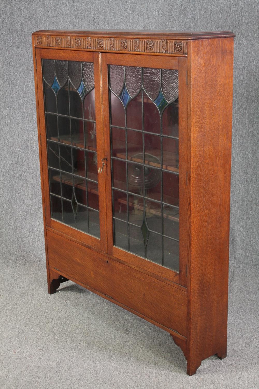 Bookcase, mid century oak with leaded and coloured glass doors. H.137 W.107 D.24cm. - Image 2 of 8