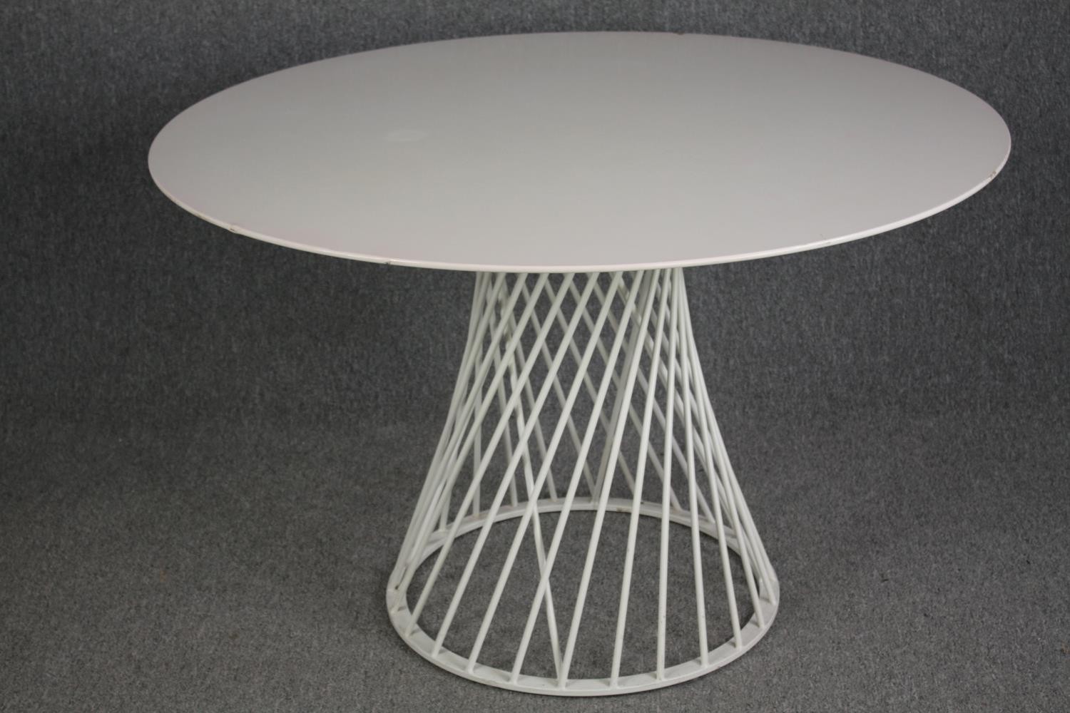 Dining table, contemporary with composite laminated top on metal base. H.72 W.120cm. (Some damage as