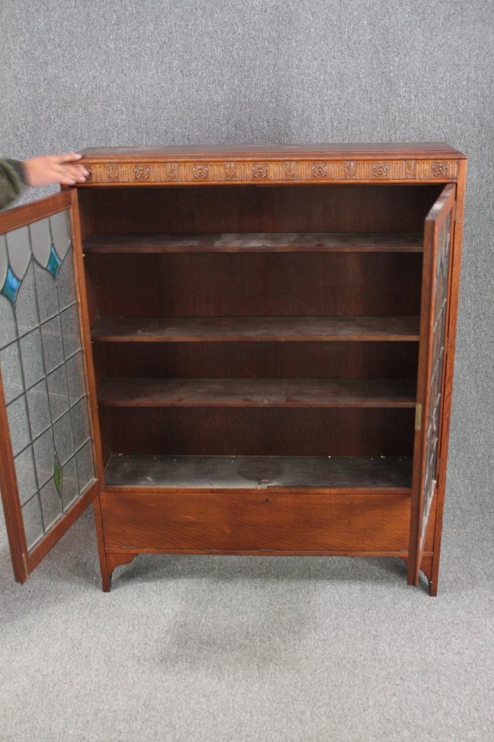 Bookcase, mid century oak with leaded and coloured glass doors. H.137 W.107 D.24cm. - Image 6 of 8