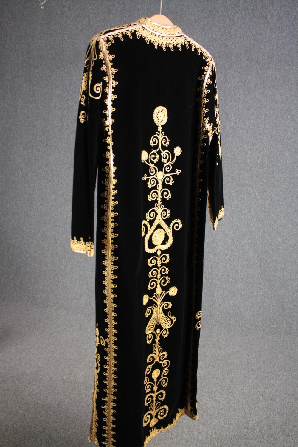 A vintage bespoke made black velvet long coat with gold brocade and thread embellishment. - Image 3 of 8