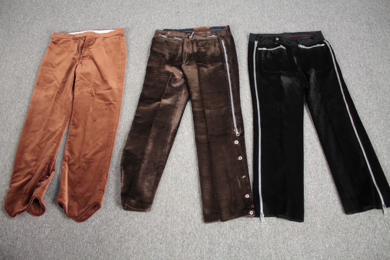 Three pairs of bespoke made vintage velvet trousers in various colours with zip detailing.