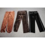 Three pairs of bespoke made vintage velvet trousers in various colours with zip detailing.
