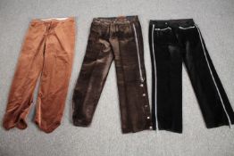 Three pairs of bespoke made vintage velvet trousers in various colours with zip detailing.