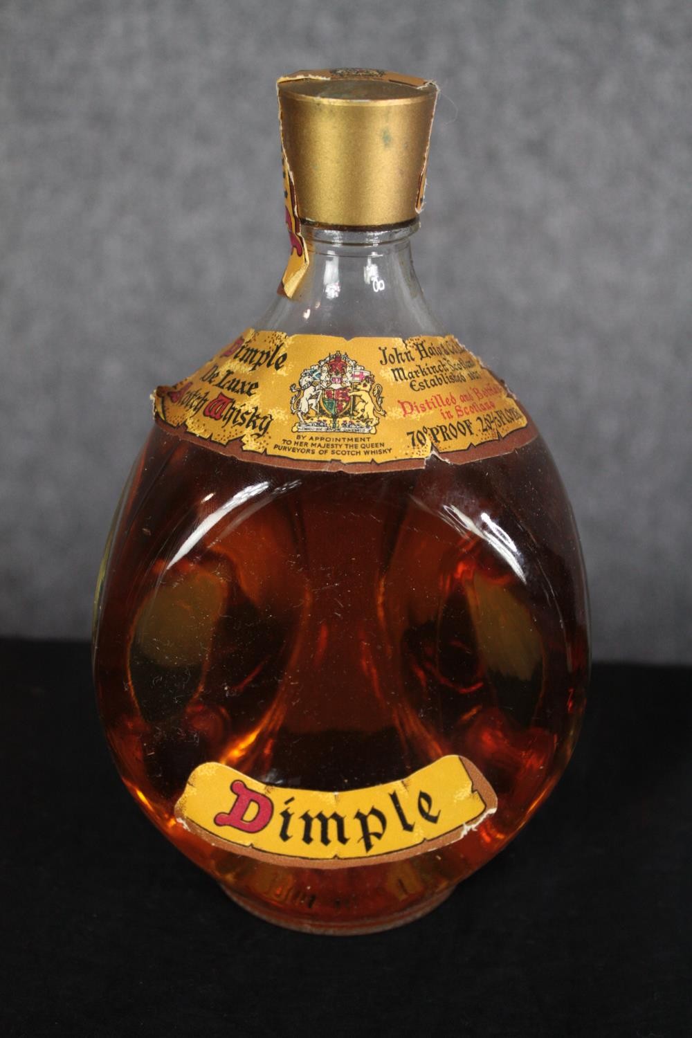 A vintage unopened bottle of 70% proof Dimple whiskey. Probably bottled in the late 70s. Also, - Image 5 of 7