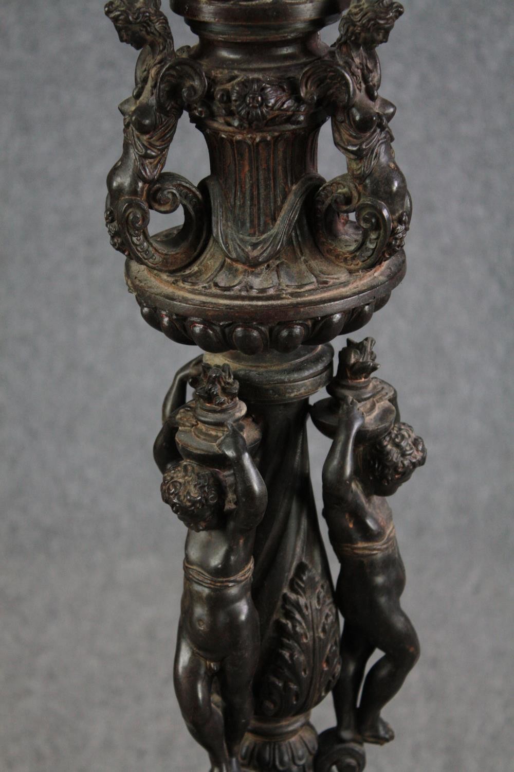 A large bronze 19th century Classical style figural torchere decorated with putti holding the - Image 4 of 11