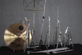 A set of Gibraltar drum and cymbal stands. Also, a music stand and a Stagg made cymbal. L.100 cm. (