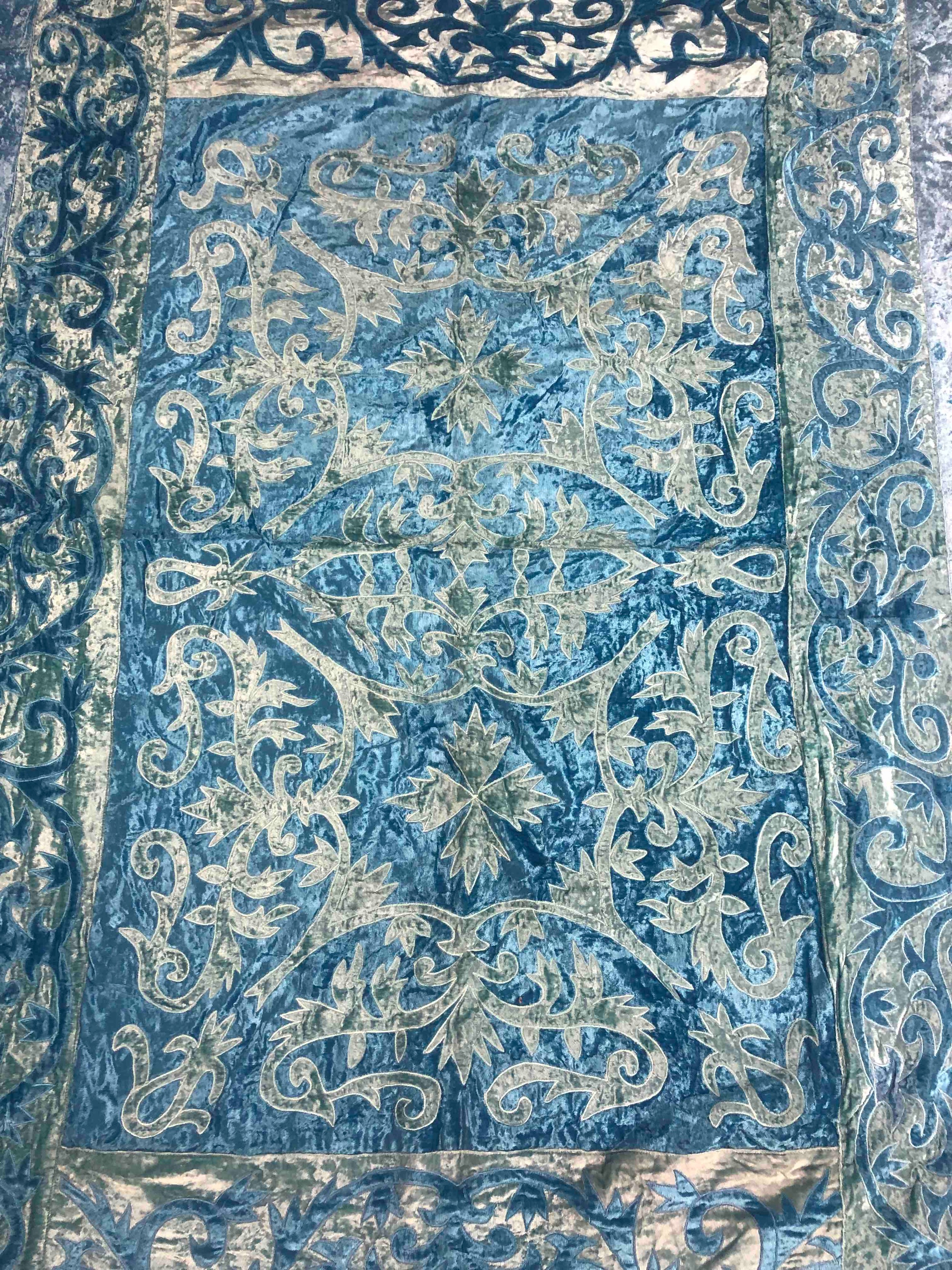 An Indian cotton bedspread embroidered in shades of blue and teal. L.265 W.210 cm. - Image 2 of 4