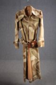 A vintage wool mix beige tone abstract pattern bespoke made long coat with statement buckle.